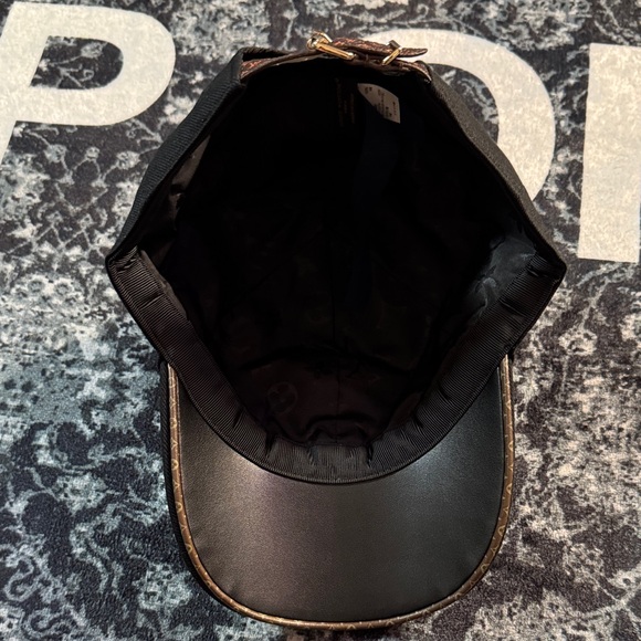 Vuitton BOB LV2054 Black 58 Almost new because... | Depop Louis Vuitton Black Hat with Gold Accent